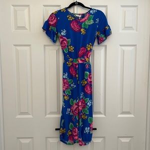 Classic Matilda Jane romper w/beautiful blue floral pattern. Well loved. Size 12
